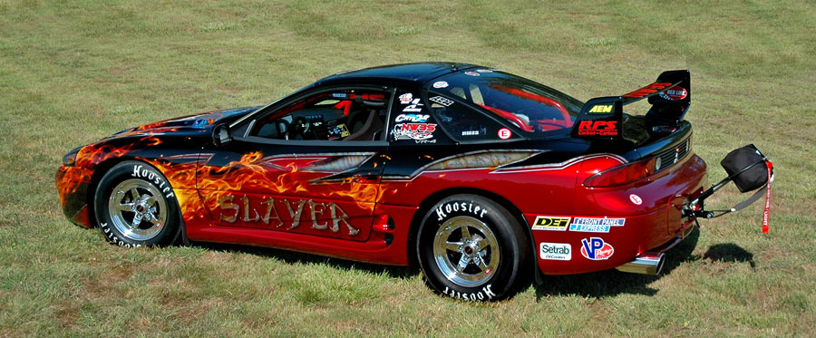 NW3S 3000GT VR4 drag race car in paddock.