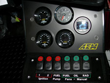 AEM gauges and COBO switches on custom CNC plates