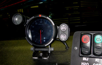 DEFI tachometer with shift light.