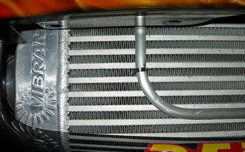 Intercooler with CO2 spray manifold mounted