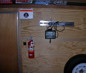 trailer fire extinguisher and halogen work light and first aid kit