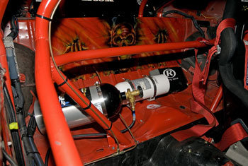 Rear Firewall showing CO2 cooling system tank and Halon Fire System Tank.